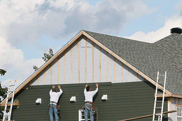 Professional Emergency Siding Repair technician working in Clinton, NY